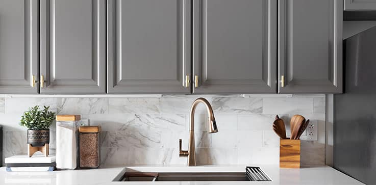 a stainless steel refrigerator in a kitchen