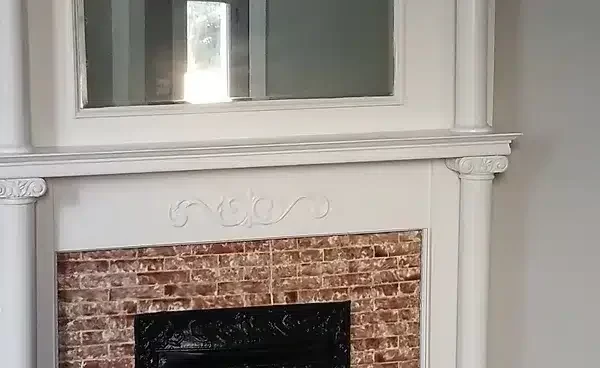 A Fire Place Sitting In A Room