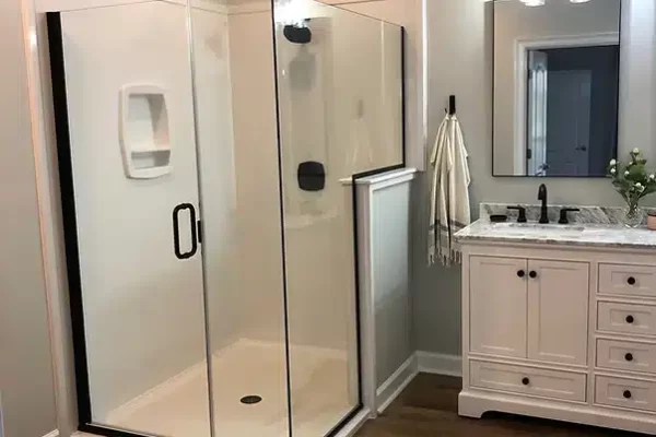 A Room With A Sink And A Mirror