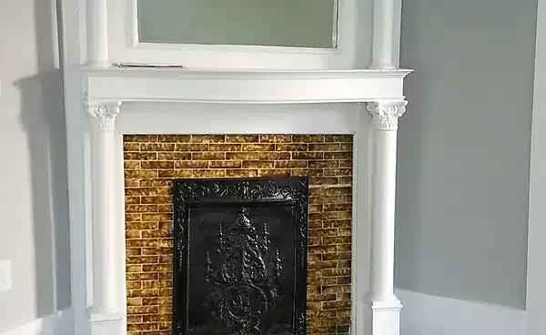 A Fire Place Sitting In A Window