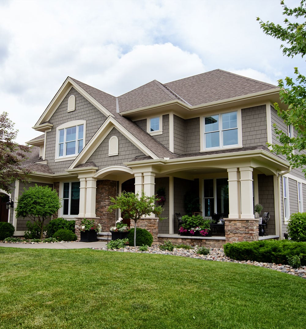 a large lawn in front of a house