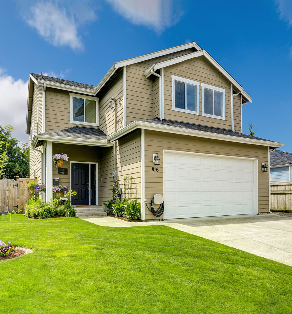 a large lawn in front of a house