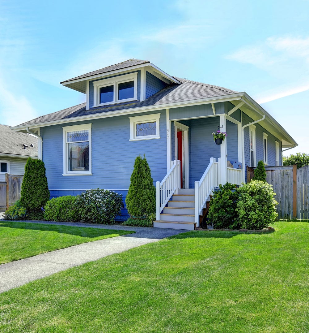 a large lawn in front of a house