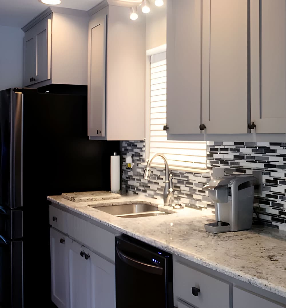 a modern kitchen with stainless steel appliances