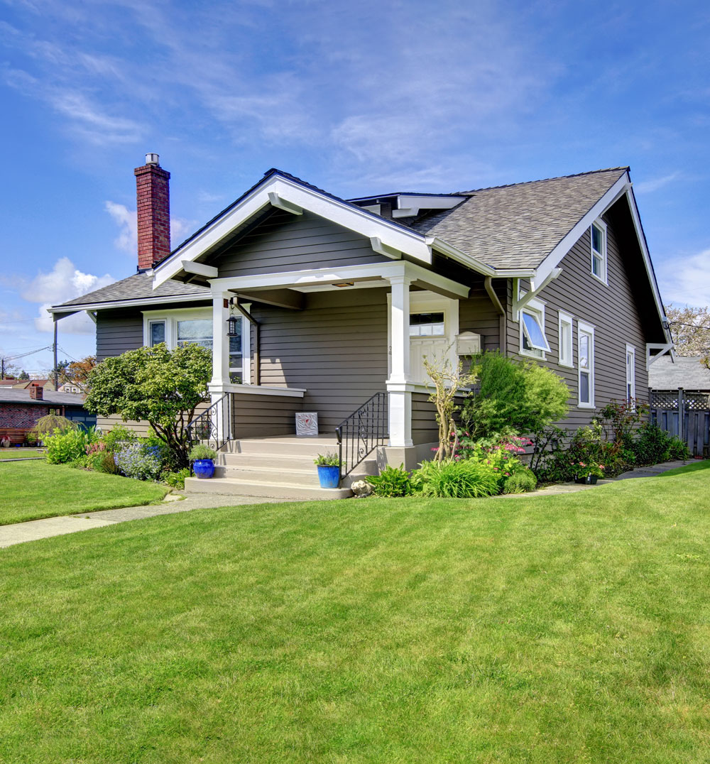 a large lawn in front of a house