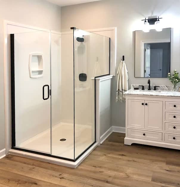 a kitchen with a sink and a mirror