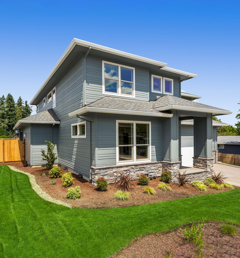 a large lawn in front of a house