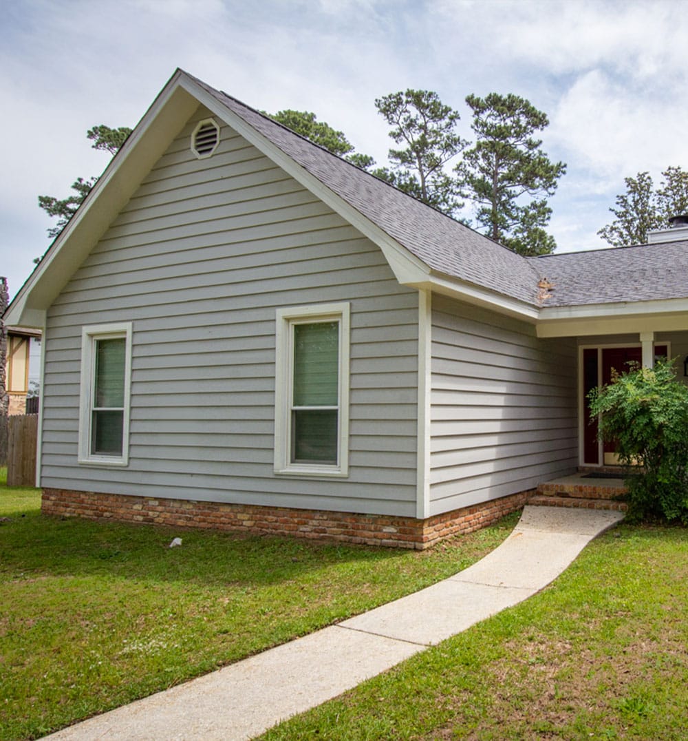 a large lawn in front of a house