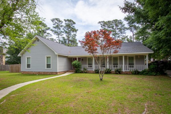 A Large Lawn In Front Of A House